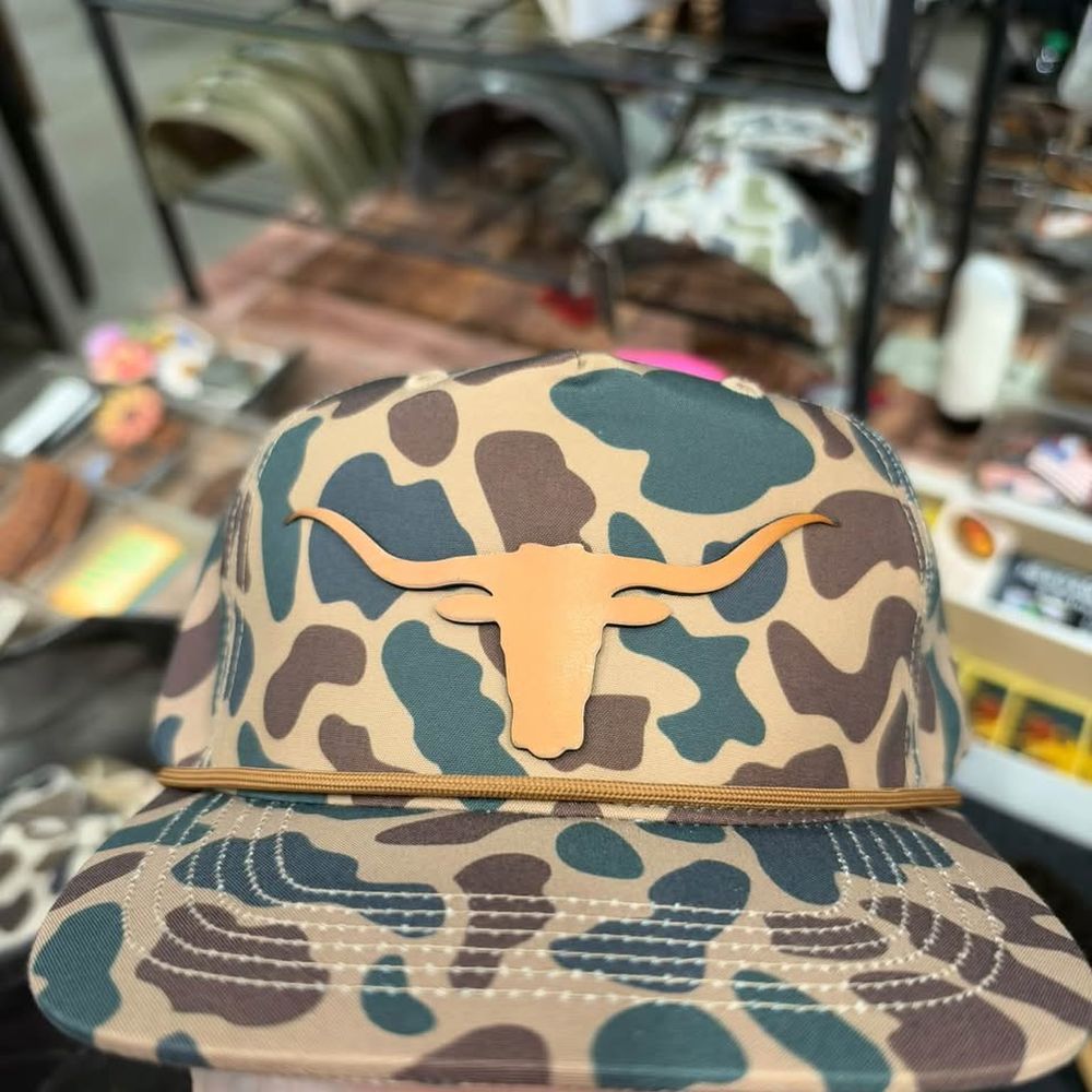 Vintage duck camo rope hat with a contour-cut leather longhorn skull patch